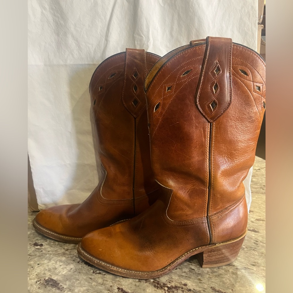 Double H brown leathered boots.